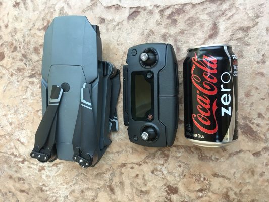 DJI Mavic Pro folded with Coke Zero can